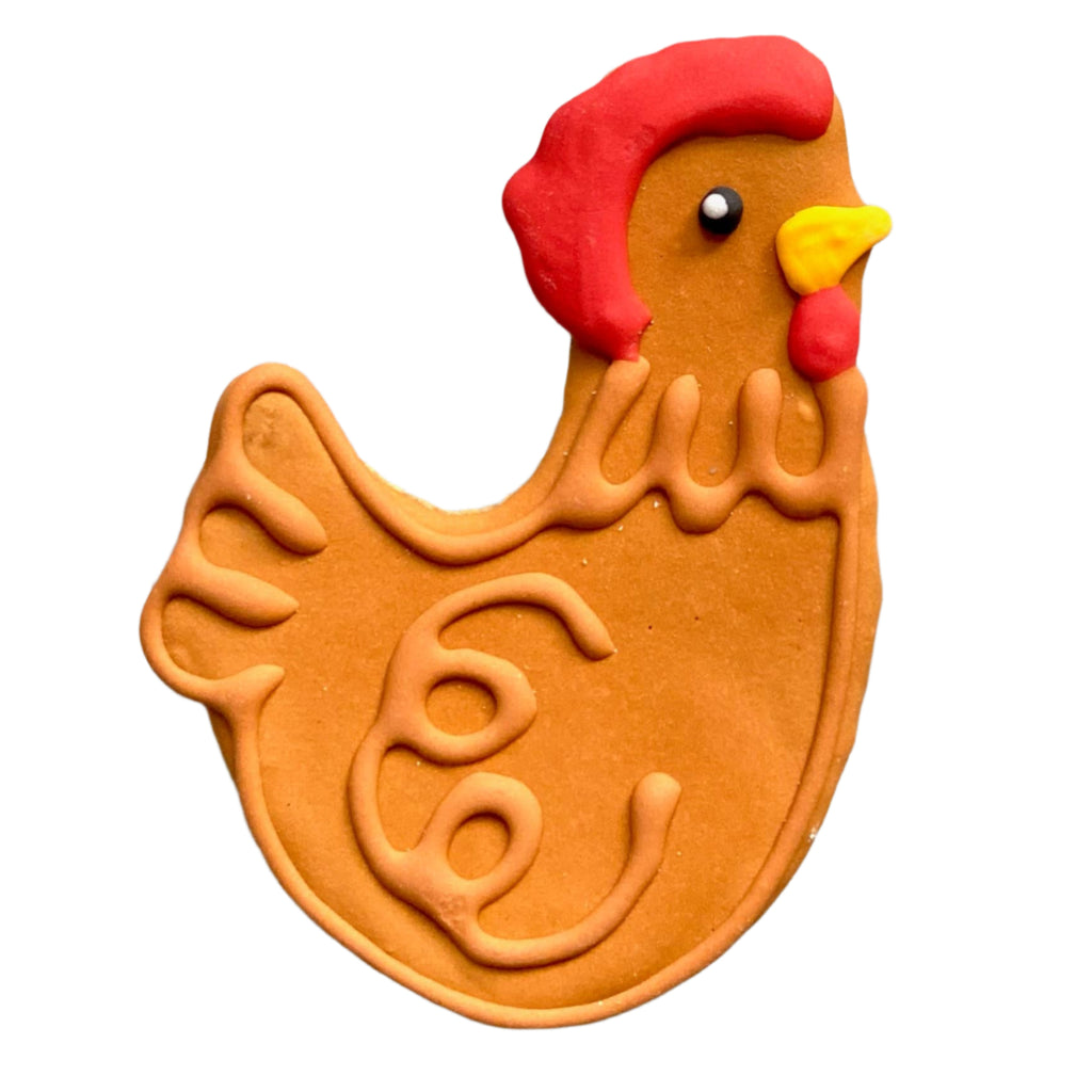 Chicken-shaped cookie cutter on a grid background